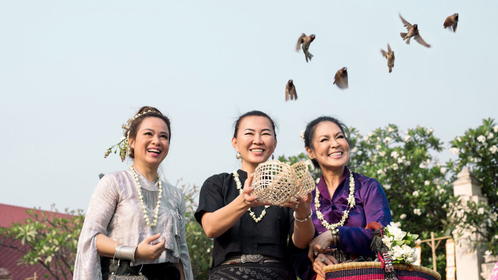 women release birds during Songkran