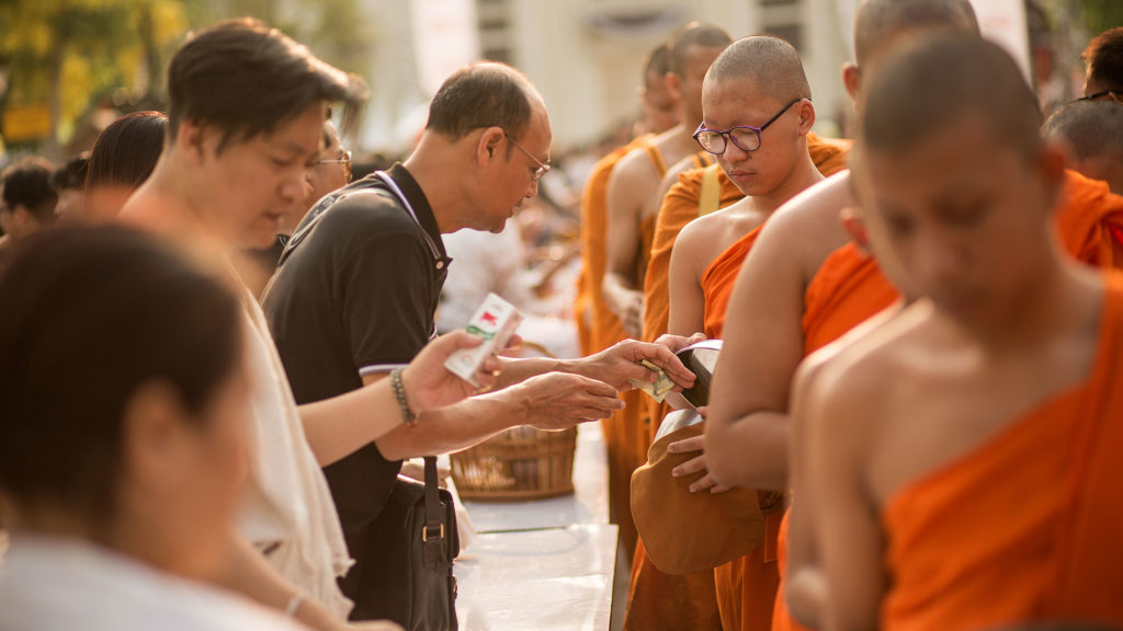 Buddhist monks receive offerings