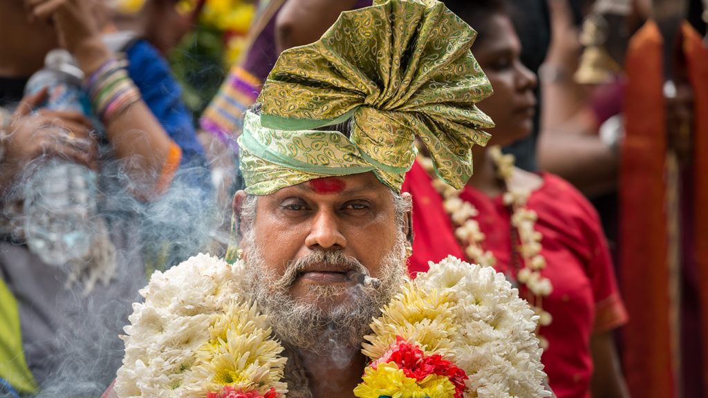 A Hindu man at the festival of Thaipusam.