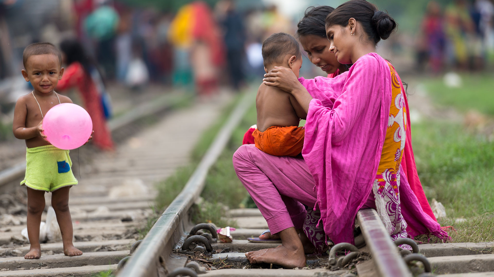 Families live along the railroad tracks in Bangladesh