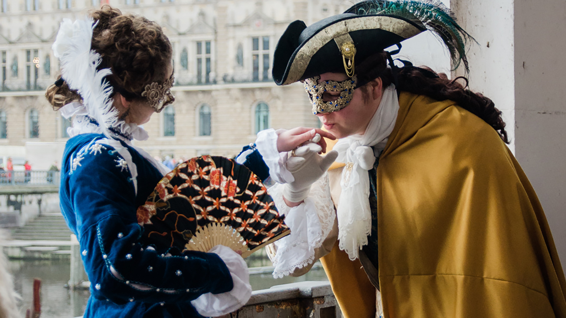 Revelers in medieval costumes celebrate Carnival. 