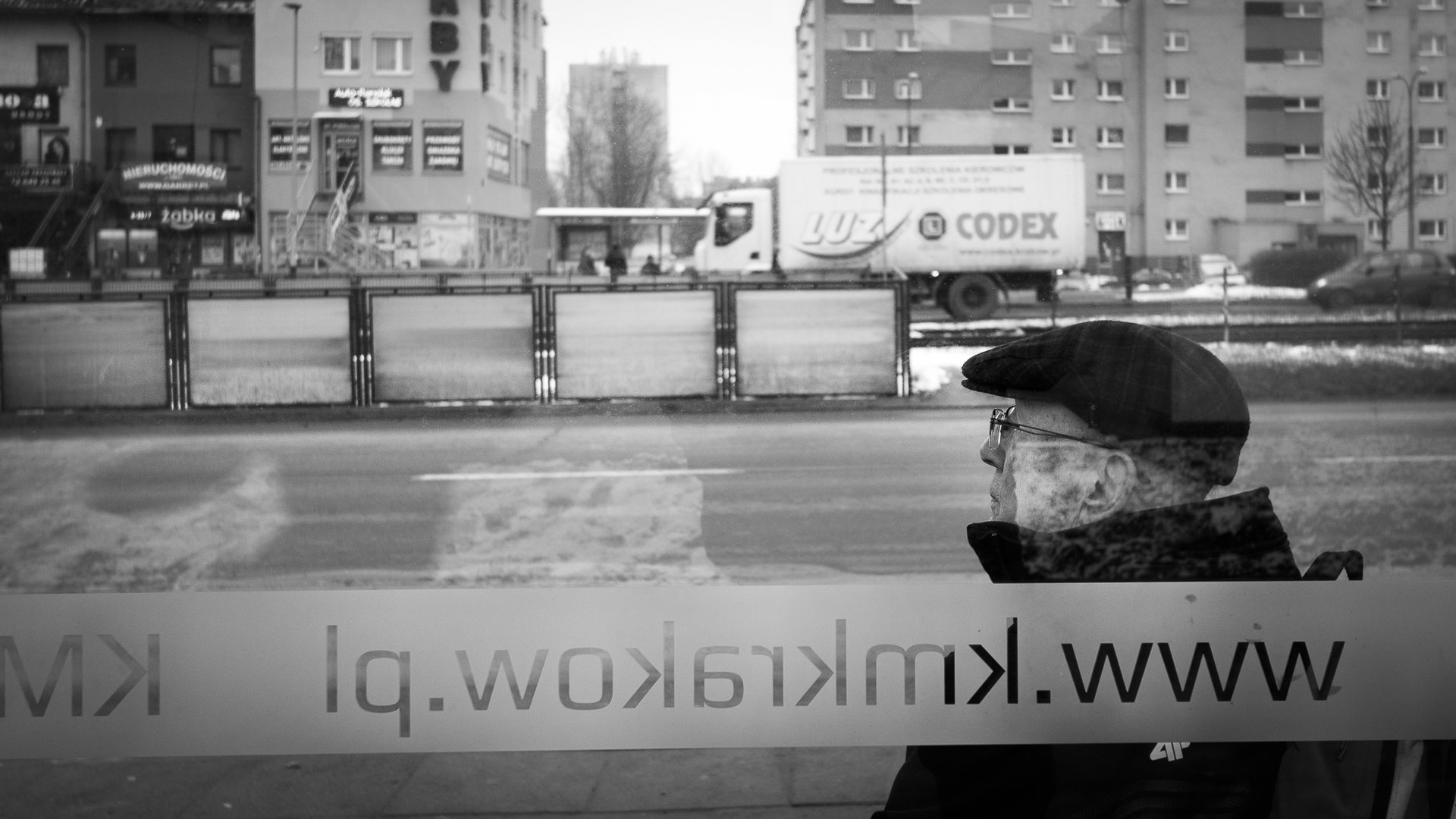 A Polish man waits patiently for a tram in Nowa Huta. 