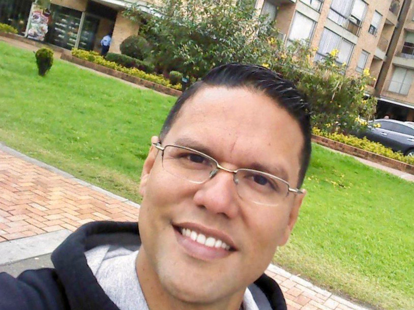 Fernando* takes a selfie in Colombia.