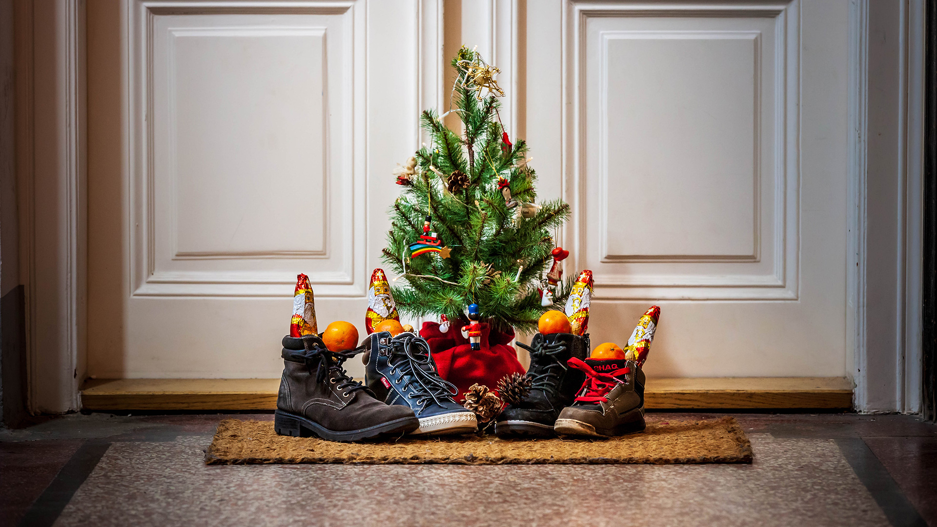 Shoes placed outside a door in Vienna, Austria are filled with gifts from Saint Nicholas. 