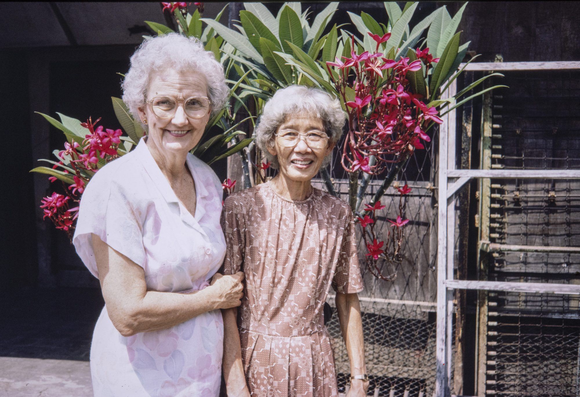 Catherine Walker poses with Mrs. Chang in Semarang, Indonesia, in 1985.