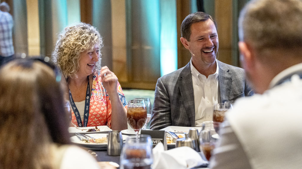 Paul and Michelle Chitwood enjoy dinner and fellowship with friends at the IMB dinner held during the Southern Baptist Convention annual meeting.