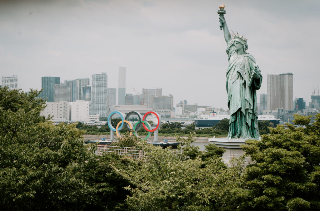 A replica of the Statue of Liberty overlooks Tokyo Bay and the Olympics rings. The statue is a tribute to Japan’s ties to France. French sculptor Frédéric Auguste Bartholdi designed the Statue of Liberty. The statue is situated in Odaiba, Japan, which is home to the highest concentration of Olympic events.