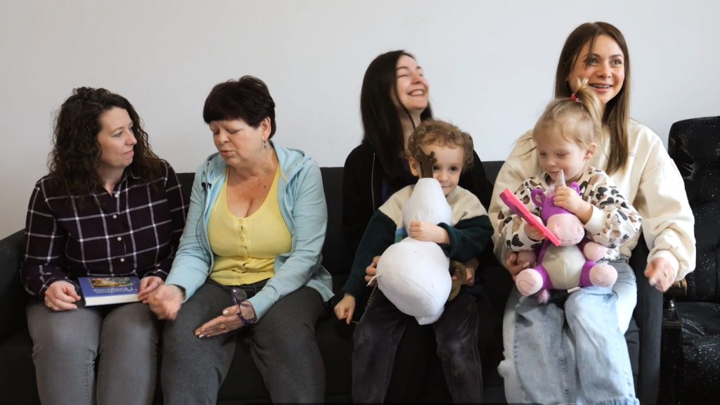 Holly McMickle, IMB missionary serving in Poland, wraps up a Bible study time at the Ukrainian Refuge House. The women at this center think of her as a “second Mom” as she took care of them and shared the gospel. IMB Photo